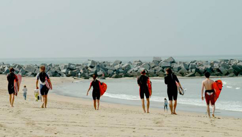 A group on their way to surfing